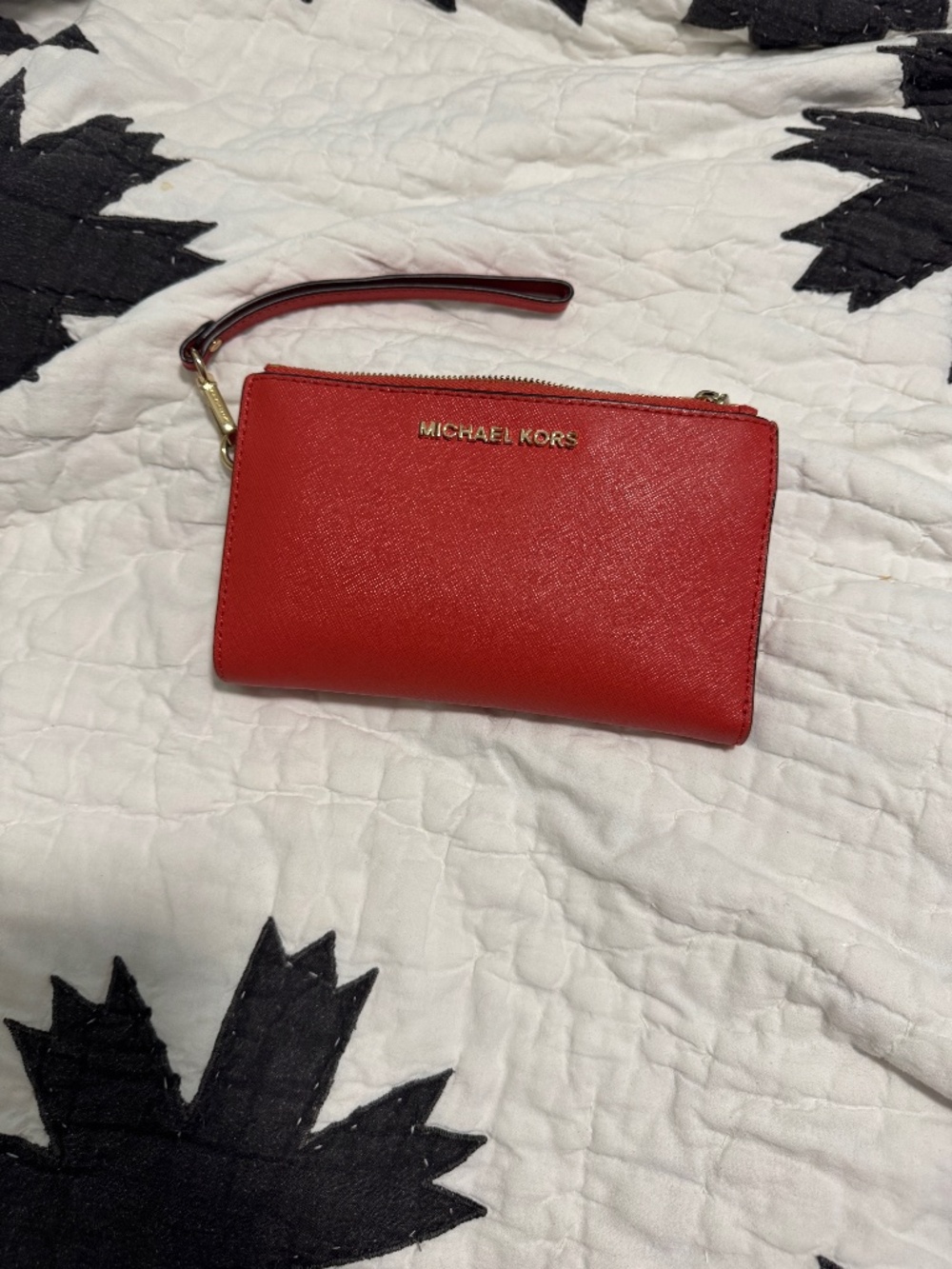Michael Kors MK Wristlet holds iphone EUC